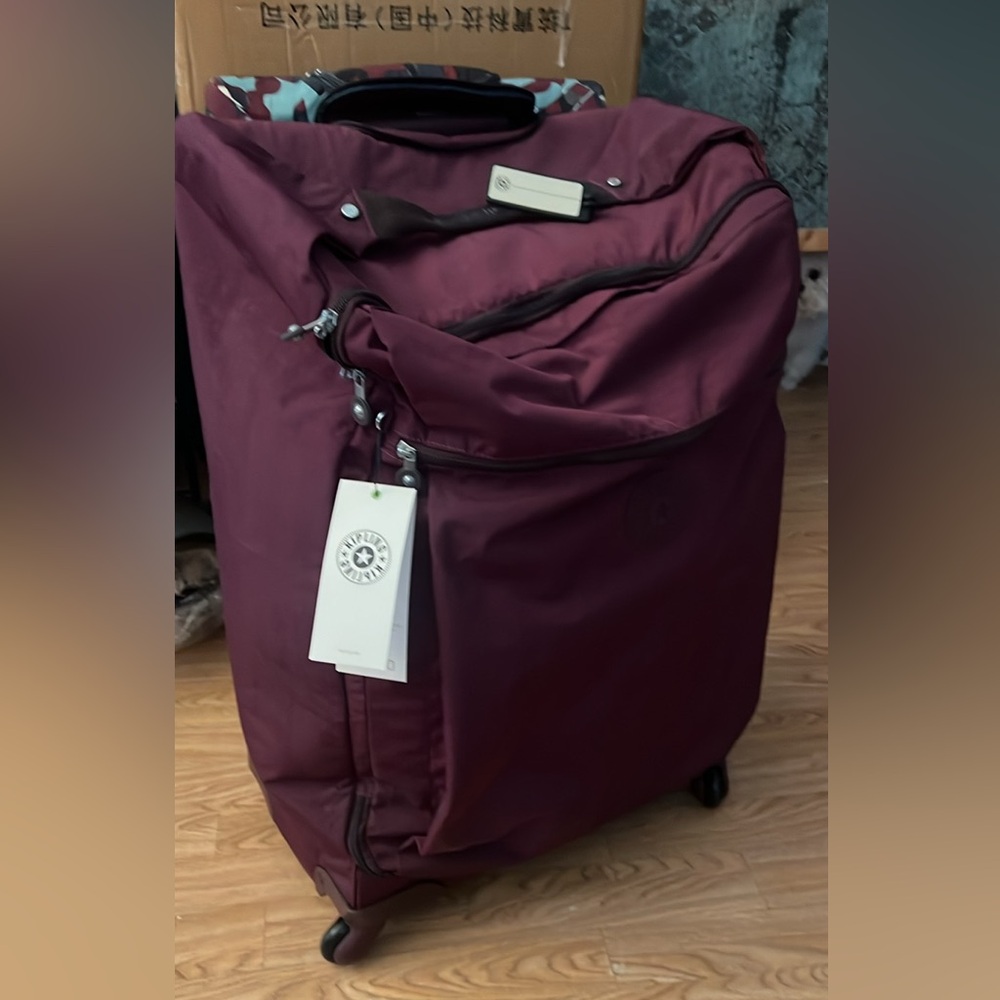 Kipling Darcey Large 29” Carry on Rolling Luggage dark plum